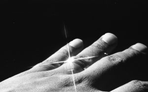 image of a man's hand with wedding band